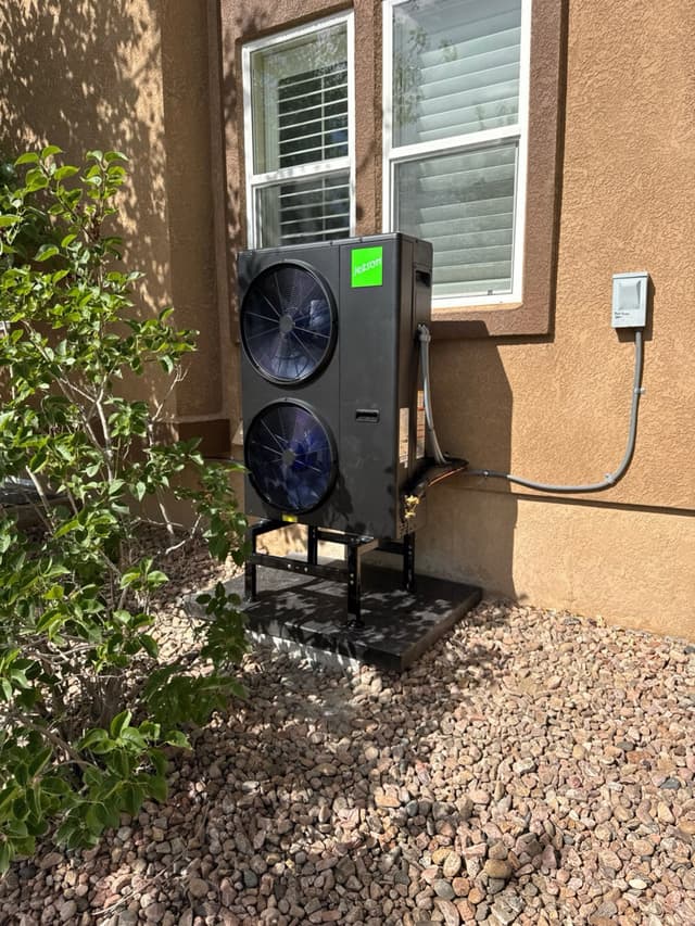 4-ton central ducted heat pump installed outside a home in Colorado Springs, Colorado.