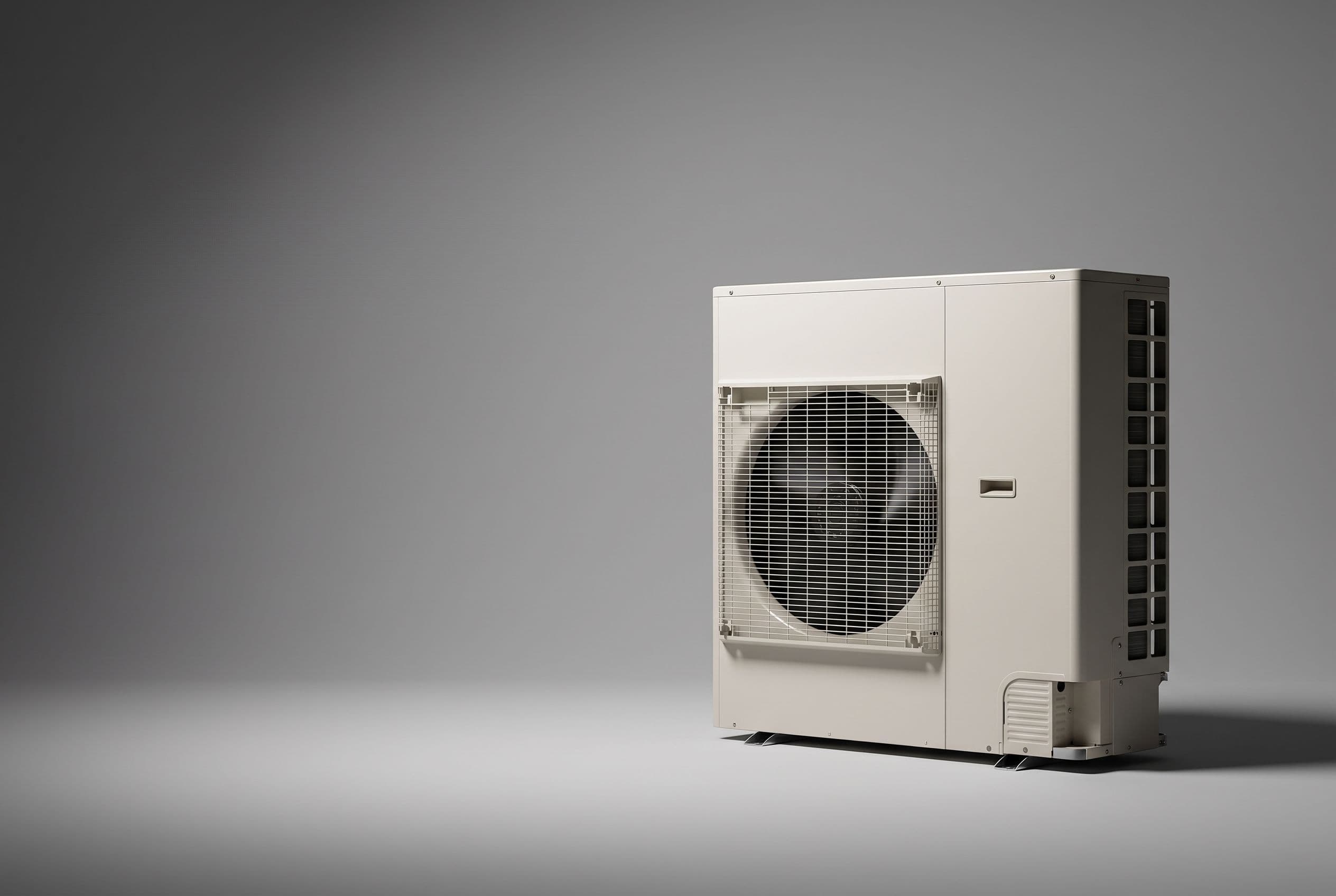Studio photograph of a Goodman heat pump outdoor unit