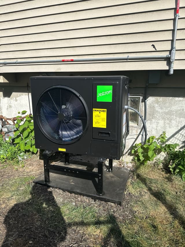 3-ton central ducted heat pump installed outside a home in Weymouth, Massachusetts.