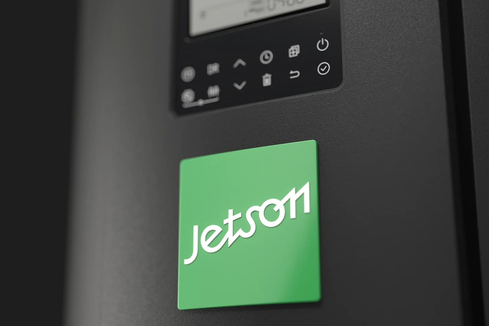 Close-up of the Jetson Water control panel and badge