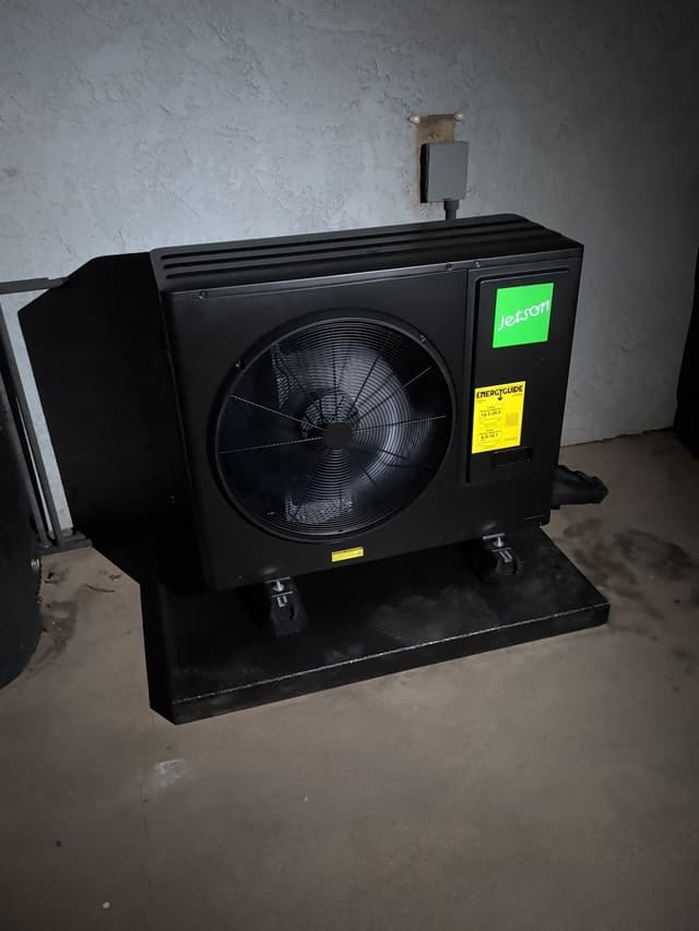 3-ton Jetson Air central ducted heat pump unit installed indoors against a stucco wall in Loma Linda, CA, with electrical disconnect box mounted above.